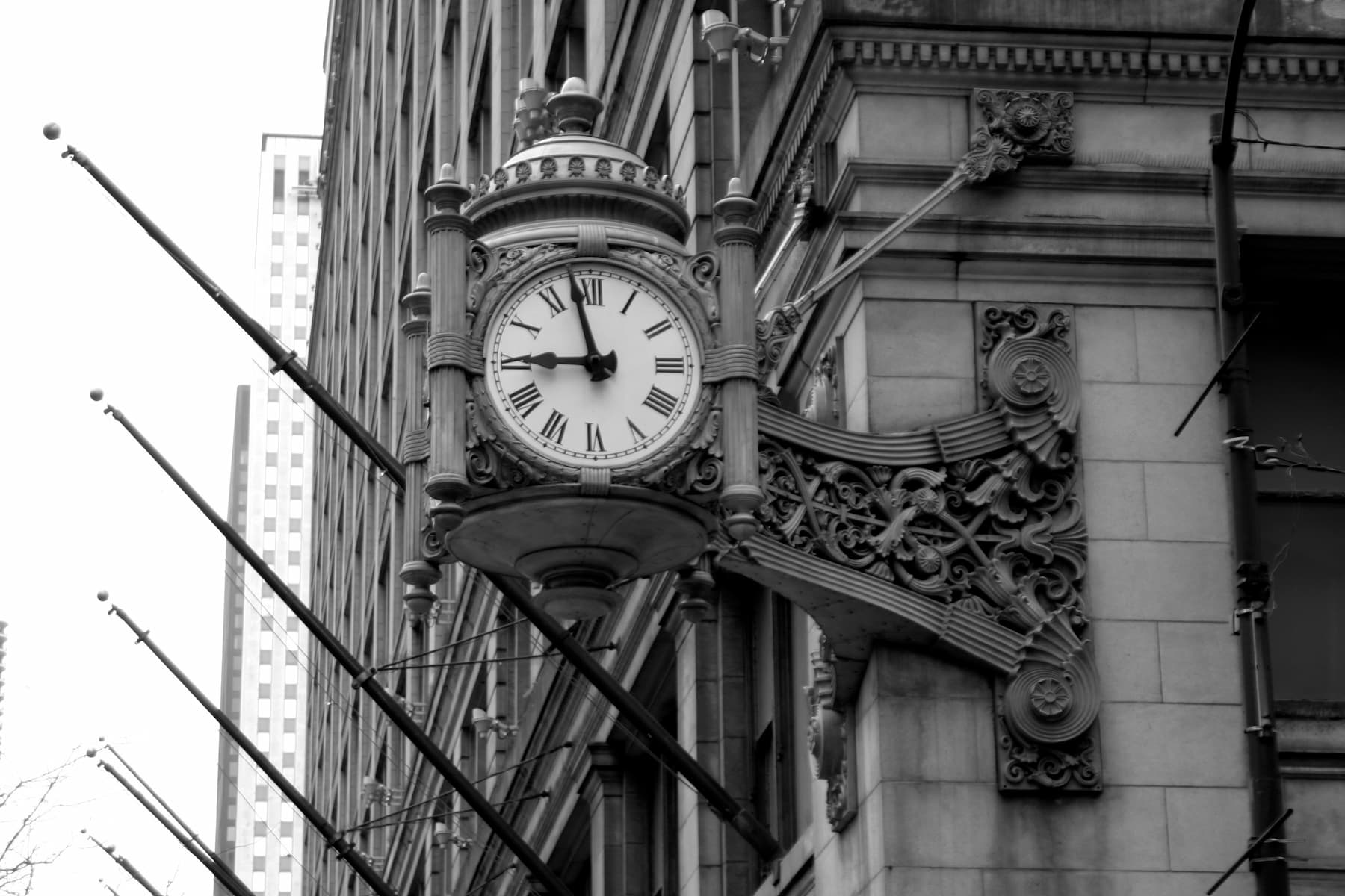 Ornate clock mounted on side of building